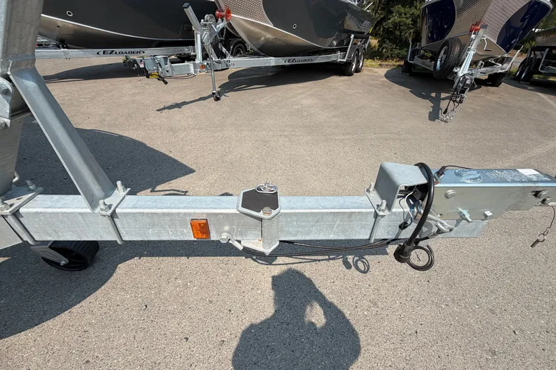 Slide: The Image of Trailer hitch of a 2024 Hewescraft 210 Sea Runner ET on pavement. - 22