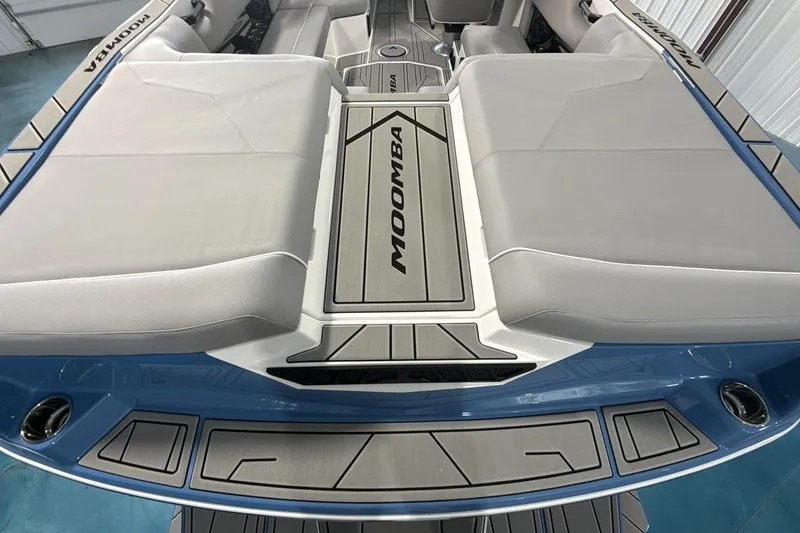 Slide: The Image of 2027 Moomba Max boat interior with sleek seating and modern design. - 19
