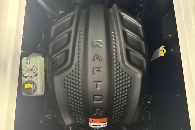 Slide: The Image of 2027 Moomba Max engine compartment featuring a Raptor engine cover. - 20