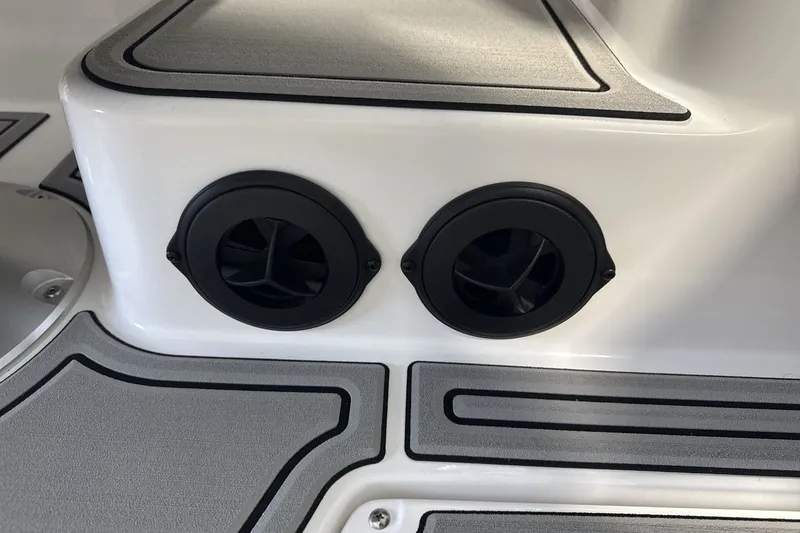Slide: The Image of Close-up of 2027 Moomba Max boat interior with dual black air vents. - 22