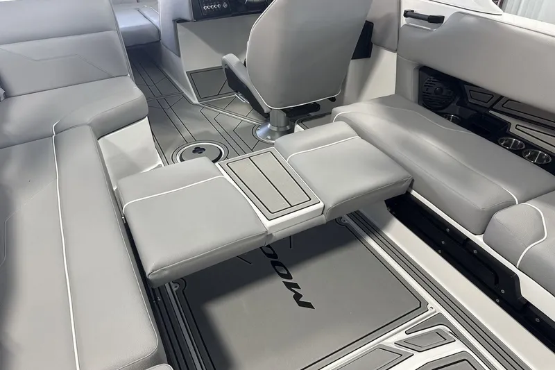 Slide: The Image of Interior of 2027 Moomba Max boat with gray seating and modern design. - 21