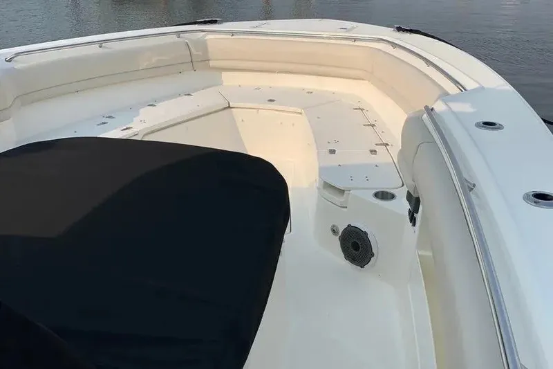 Slide: The Image of 2019 Boston Whaler 380 Outrage boat deck with seating and covered area. - 34