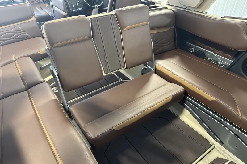 Slide: The Image of Luxurious brown leather interior of 2027 Supra SL 550 with foldable seating. - 60