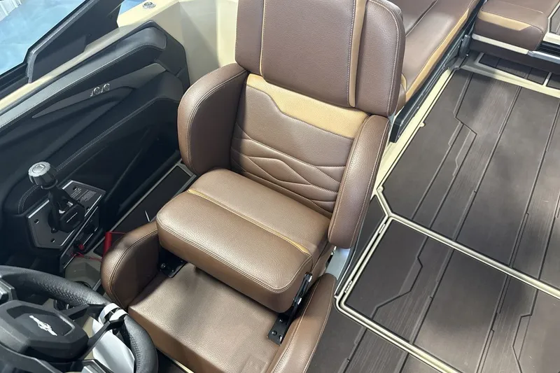 Slide: The Image of Luxurious brown leather seat in 2027 Supra SL 550 boat interior. - 49