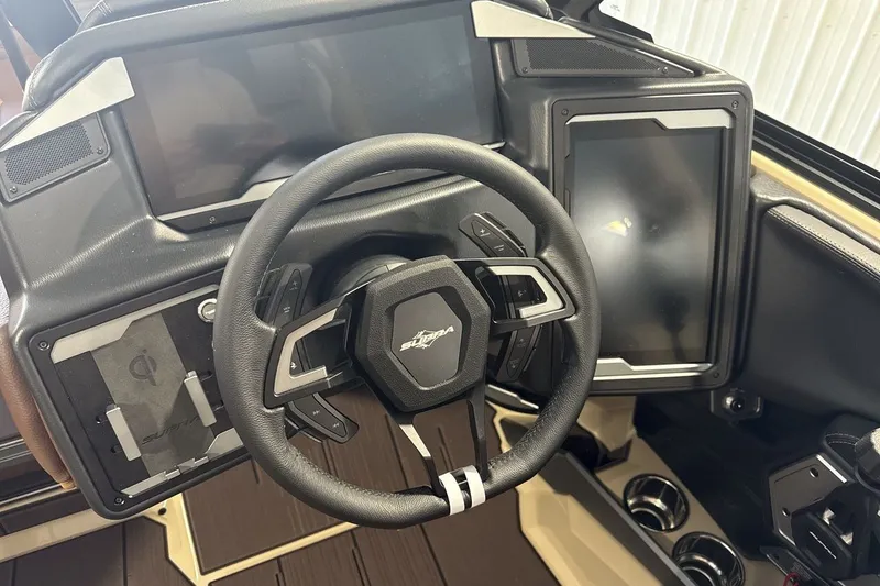 Slide: The Image of Steering wheel and dashboard of 2027 Supra SL 550 with modern digital displays. - 51