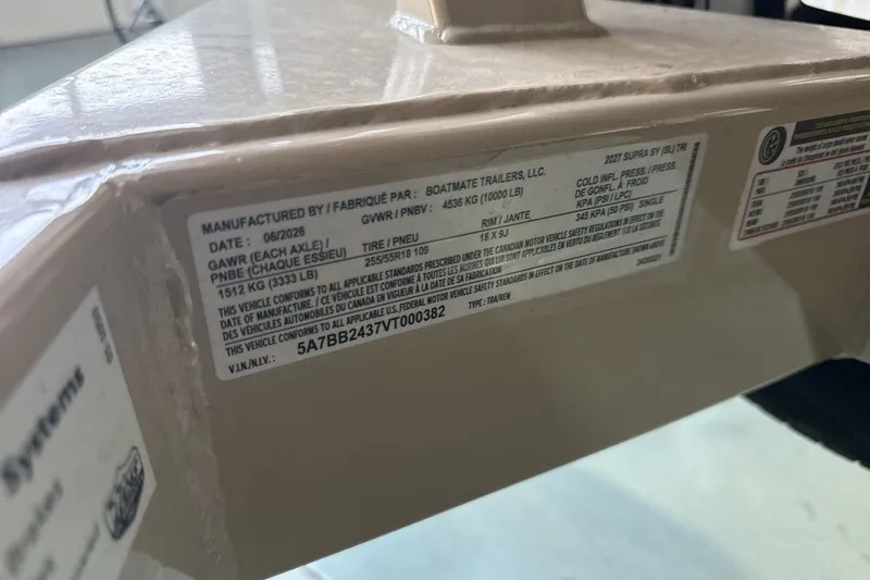 Slide: The Image of Label on 2027 Supra SL 550 trailer, detailing specifications and manufacturing information. - 63