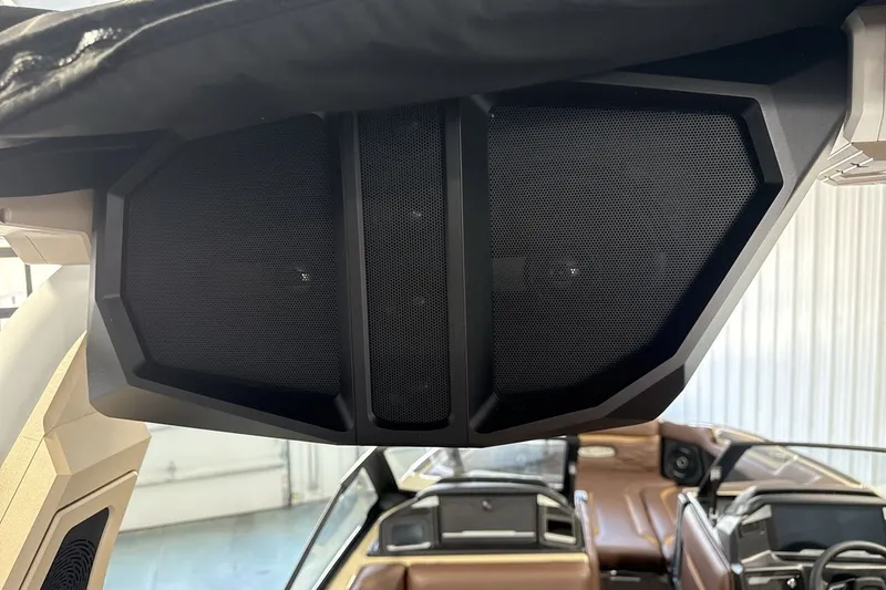 Slide: The Image of 2027 Supra SL 550 boat interior with premium audio system and luxurious seating. - 57