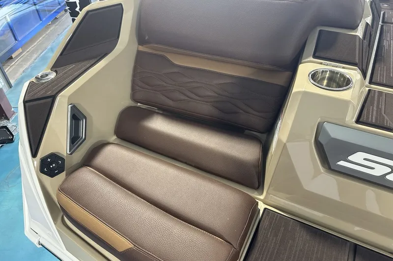 Slide: The Image of Luxurious brown leather seating in 2027 Supra SL 550 boat interior. - 55
