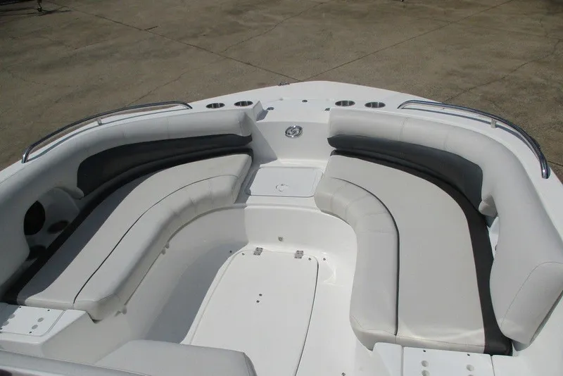 Slide: The Image of 2019 Hurricane SunDeck Sport CC 231 OB boat interior with spacious seating and cup holders. - 8