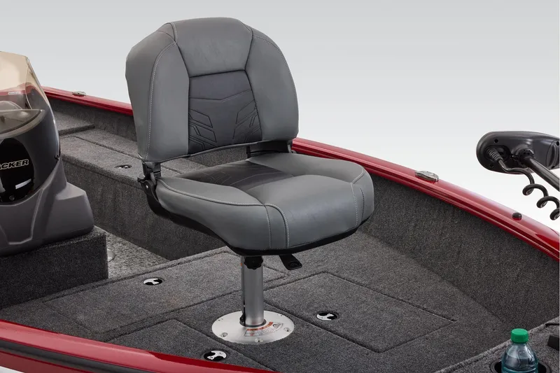 Slide: The Image of Manufacturer Provided Image: 2026 Tracker Super Guide V-16 SC boat seat, gray upholstery, red trim, carpeted deck. - 17