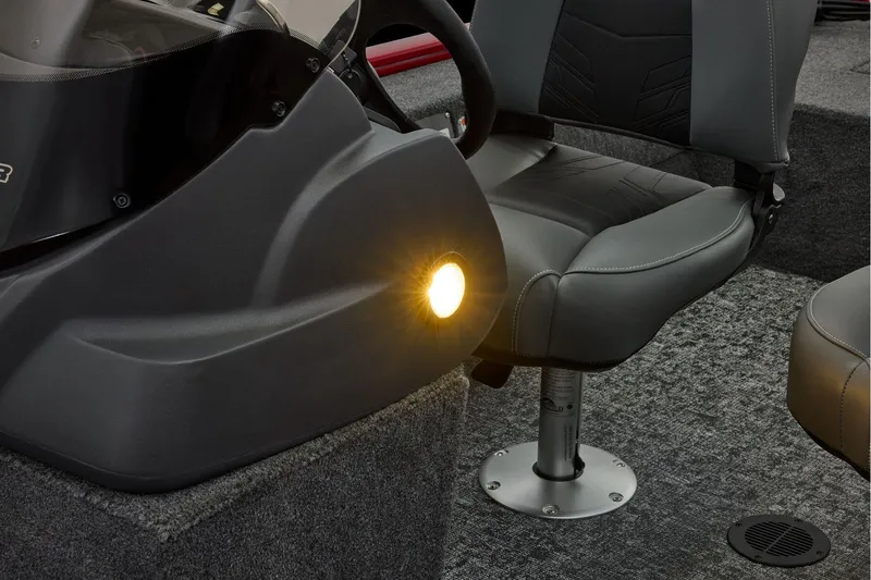 Slide: The Image of Manufacturer Provided Image: 2026 Tracker Super Guide V-16 SC boat interior with illuminated console and seating. - 28