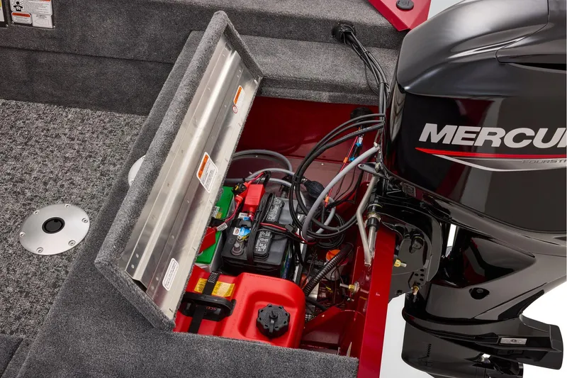 Slide: The Image of Manufacturer Provided Image: 2026 Tracker Super Guide V-16 SC boat engine compartment with Mercury motor and battery. - 33