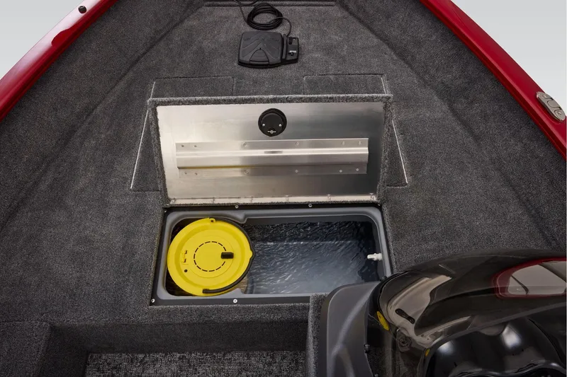 Slide: The Image of Manufacturer Provided Image: 2026 Tracker Super Guide V-16 SC boat interior with storage compartment and yellow lid. - 19