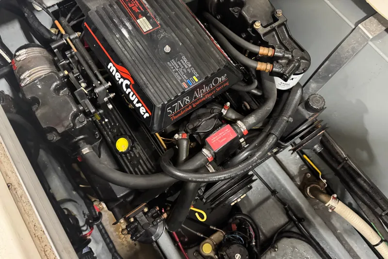 Slide: The Image of Engine compartment of a 1994 Sea Ray 300 Sundancer with MerCruiser 5.7L V8 engine. - 19