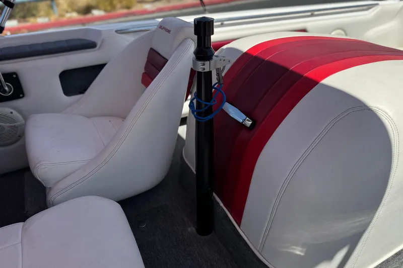 Slide: The Image of Interior of a 1991 Ski Supreme MS Tournament Series boat with white and red seating. - 9