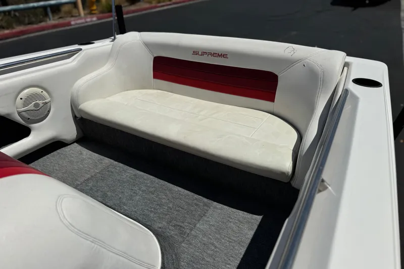 Slide: The Image of 1991 Ski Supreme MS Tournament Series boat interior with white and red seating. - 15