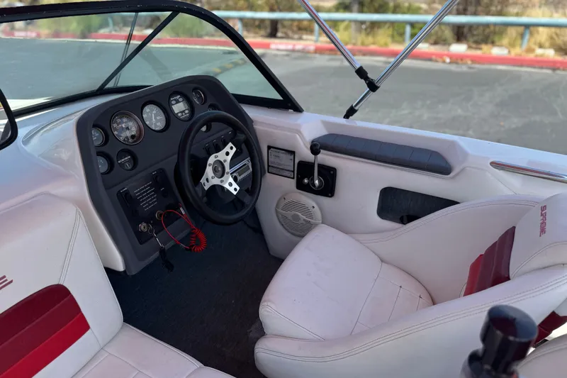 Slide: The Image of Interior of a 1991 Ski Supreme MS Tournament Series boat with steering wheel and dashboard. - 16
