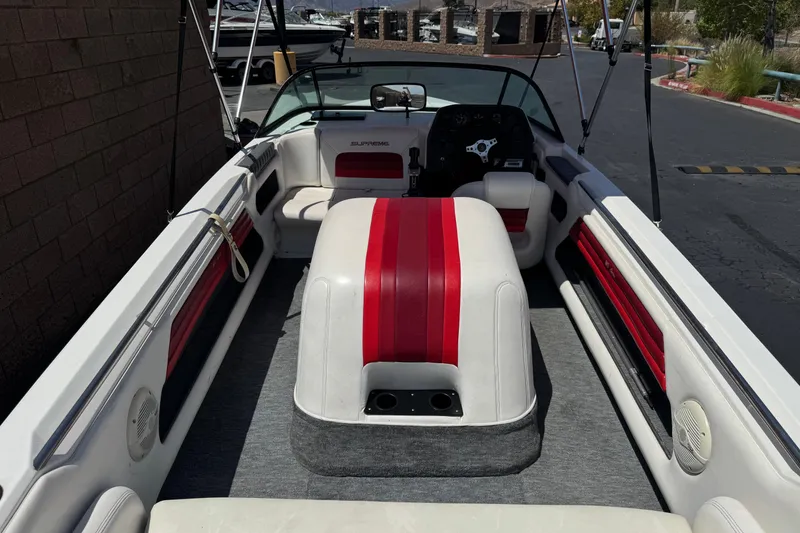 Slide: The Image of 1991 Ski Supreme MS Tournament Series boat interior with red and white seating. - 8