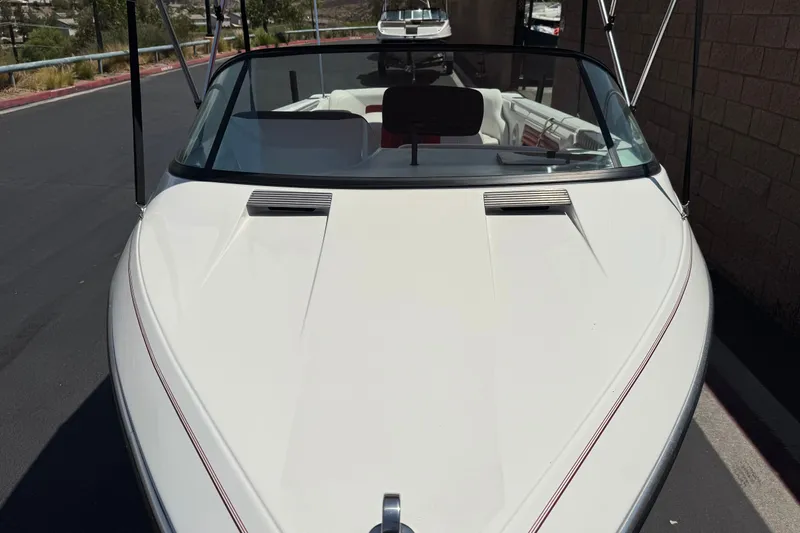 Slide: The Image of 1991 Ski Supreme MS Tournament Series boat, white exterior, parked outdoors. - 12