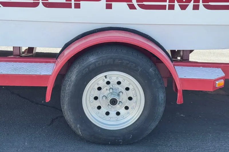 Slide: The Image of Red trailer wheel of 1991 Ski Supreme MS Tournament Series boat. - 20