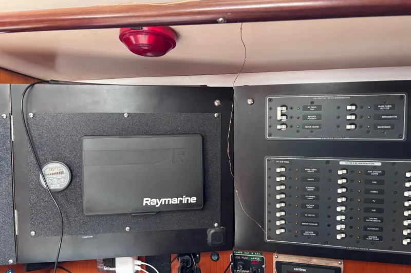 Slide: The Image of Electrical control panel on a 1993 Beneteau Oceanis 400 sailboat with Raymarine equipment. - 27