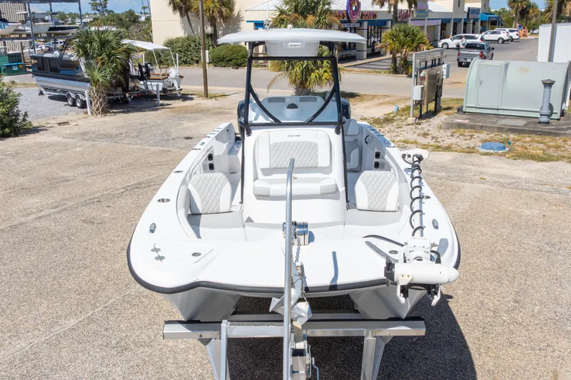 Slide: The Image of 2022 Twin Vee 240 GFX CC boat on trailer, parked outdoors. - 14