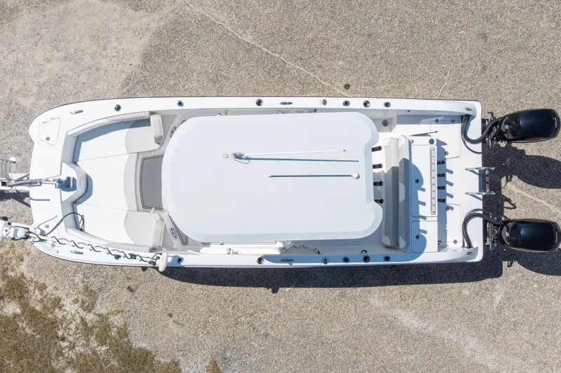 Slide: The Image of 2022 Twin Vee 240 GFX CC boat, aerial view, showcasing spacious deck and dual engines. - 15