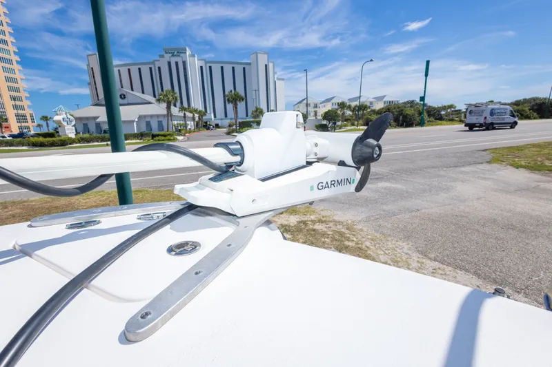Slide: The Image of Garmin marine equipment on 2022 Twin Vee 240 GFX CC boat, coastal background. - 46