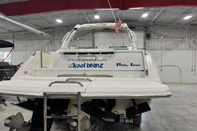 Slide: The Image of 2005 Formula 280 Bowrider boat in a garage, labeled "Kool Beanz," Pella, Iowa. - 5