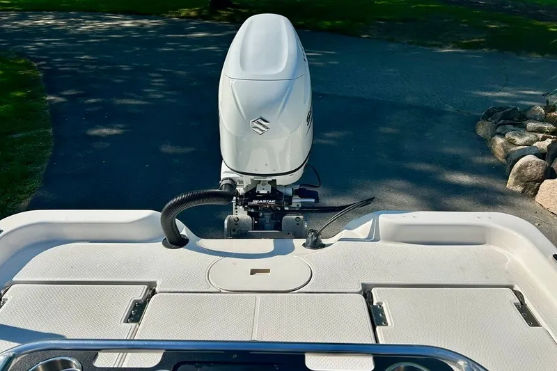 Slide: The Image of 2022 BLUEWAVE 2000 Classic boat with Suzuki outboard motor on a sunny day. - 13