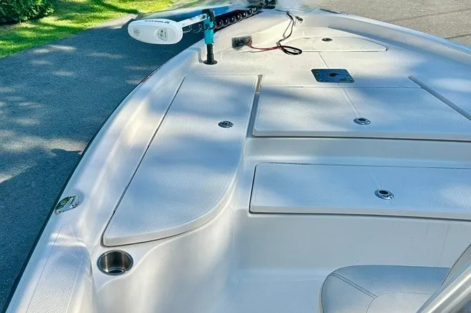 Slide: The Image of 2022 BLUEWAVE 2000 Classic boat deck with mounted equipment and storage compartments. - 14