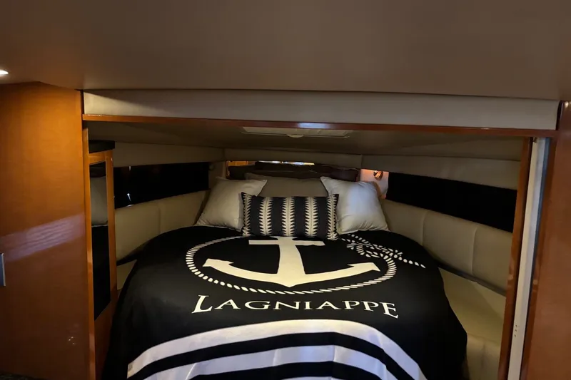Slide: The Image of Luxurious interior cabin of 2010 Chaparral Signature 370 yacht with elegant bedding. - 30