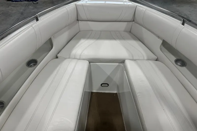 Slide: The Image of Interior of 2000 Mariah 302 Shabah boat with white leather seating. - 12
