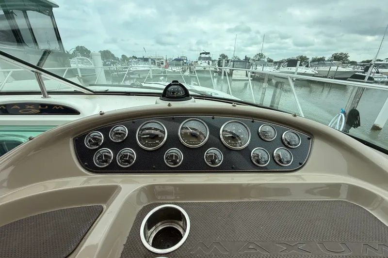 Slide: The Image of Dashboard view of 2003 Maxum 3700 SCR boat at marina. - 25