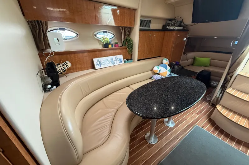 Slide: The Image of Interior of 2003 Maxum 3700 SCR yacht with elegant seating and modern decor. - 33