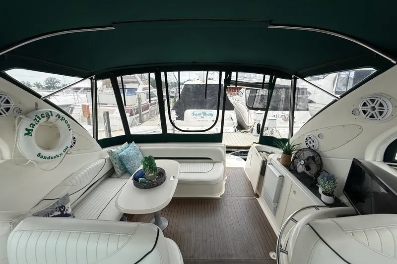 Slide: The Image of Interior of a 2003 Maxum 3700 SCR yacht with seating and decor. - 20