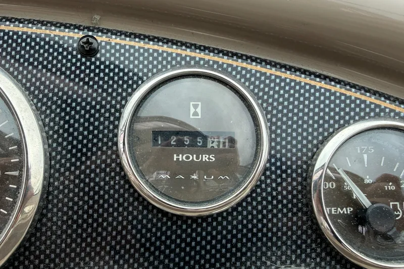 Slide: The Image of Dashboard of 2003 Maxum 3700 SCR boat showing 1255 hours on hour meter. - 26