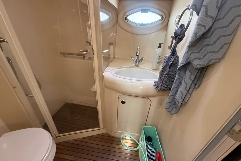 Slide: The Image of Bathroom interior of 2003 Maxum 3700 SCR yacht with sink and shower. - 49
