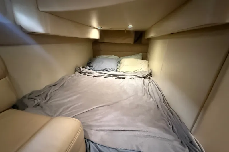 Slide: The Image of Cozy cabin interior of 2003 Maxum 3700 SCR yacht with comfortable bedding. - 47