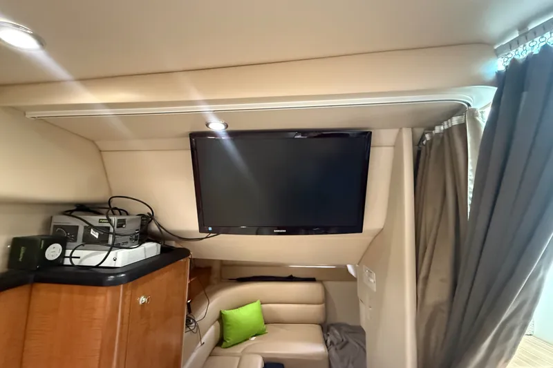 Slide: The Image of Interior of 2003 Maxum 3700 SCR yacht with TV and electronics setup. - 45