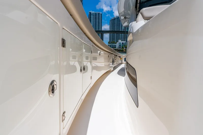 Slide: The Image of 2024 Solace 41CS yacht deck with city skyline in background. - 41