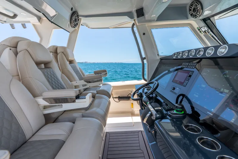 Slide: The Image of Luxurious interior of 2024 Solace 41CS boat with advanced navigation system. - 19