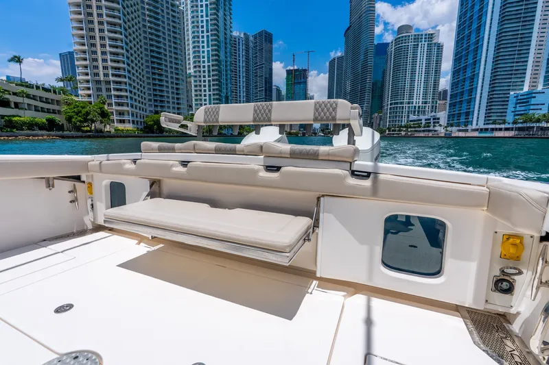 Slide: The Image of 2024 Solace 41CS yacht interior with city skyline in the background. - 26