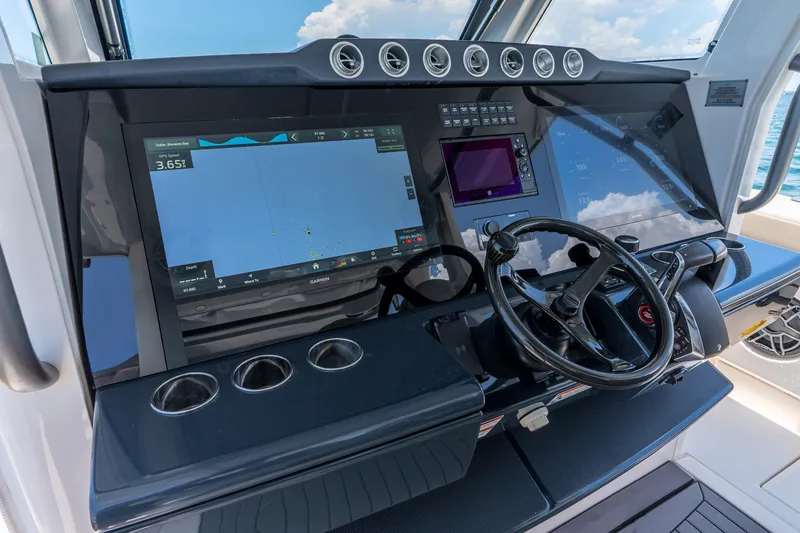 Slide: The Image of 2024 Solace 41CS helm with advanced navigation displays and steering wheel. - 21