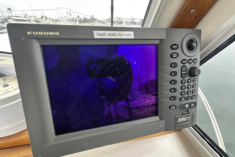 Slide: The Image of Furuno navigation system on 2001 Northern Bay 36 boat, displaying depth readings. - 17