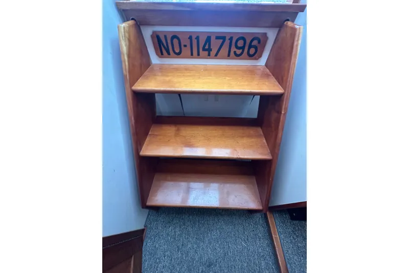 Slide: The Image of Wooden steps inside a 2001 Northern Bay 36 boat, featuring registration number NO-1147196. - 26