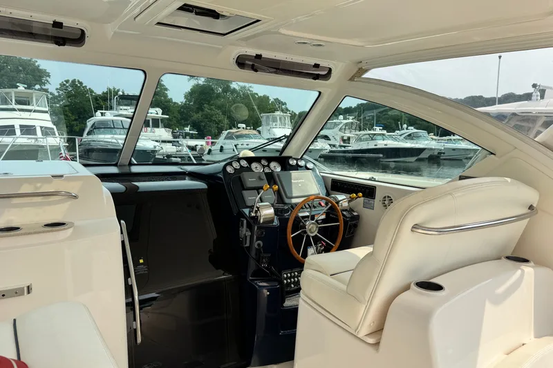 Slide: The Image of Interior view of a 2008 Tiara 3000 Open yacht at a marina. - 5