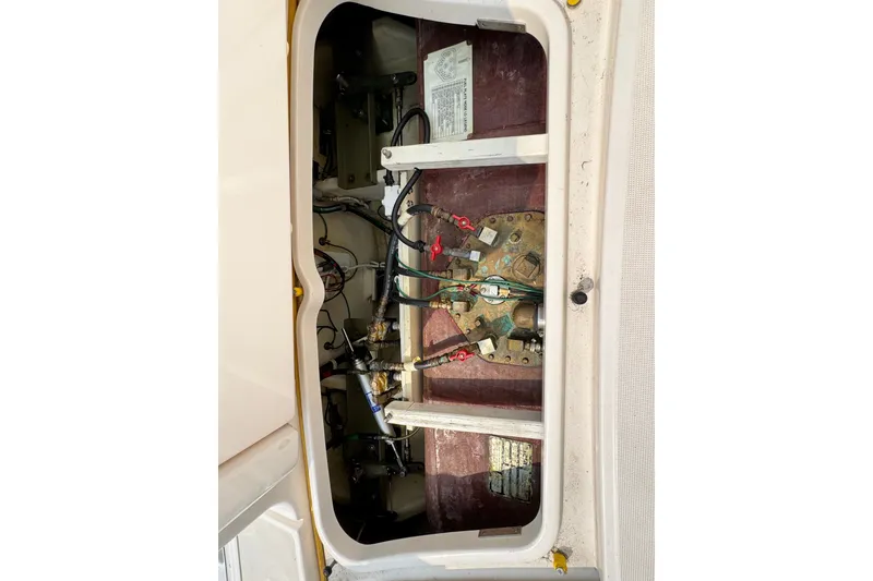 Slide: The Image of Engine compartment of a 2008 Tiara 3000 Open boat, showing wiring and components. - 13