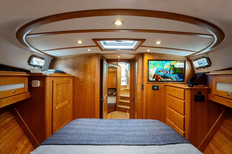 Slide: The Image of Luxurious interior of 2027 Sabre 45 Salon Express yacht with wood finish and modern amenities. - 11