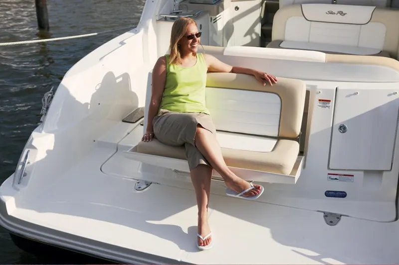 Slide: The Image of Manufacturer Provided Image: Woman relaxing on a 2012 Sea Ray 330 Sundancer boat. - 17